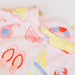Girl's loungewear set with beach-themed print on a light gray background
