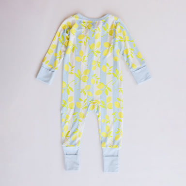 Baby onesie with yellow lemon pattern on a light blue background