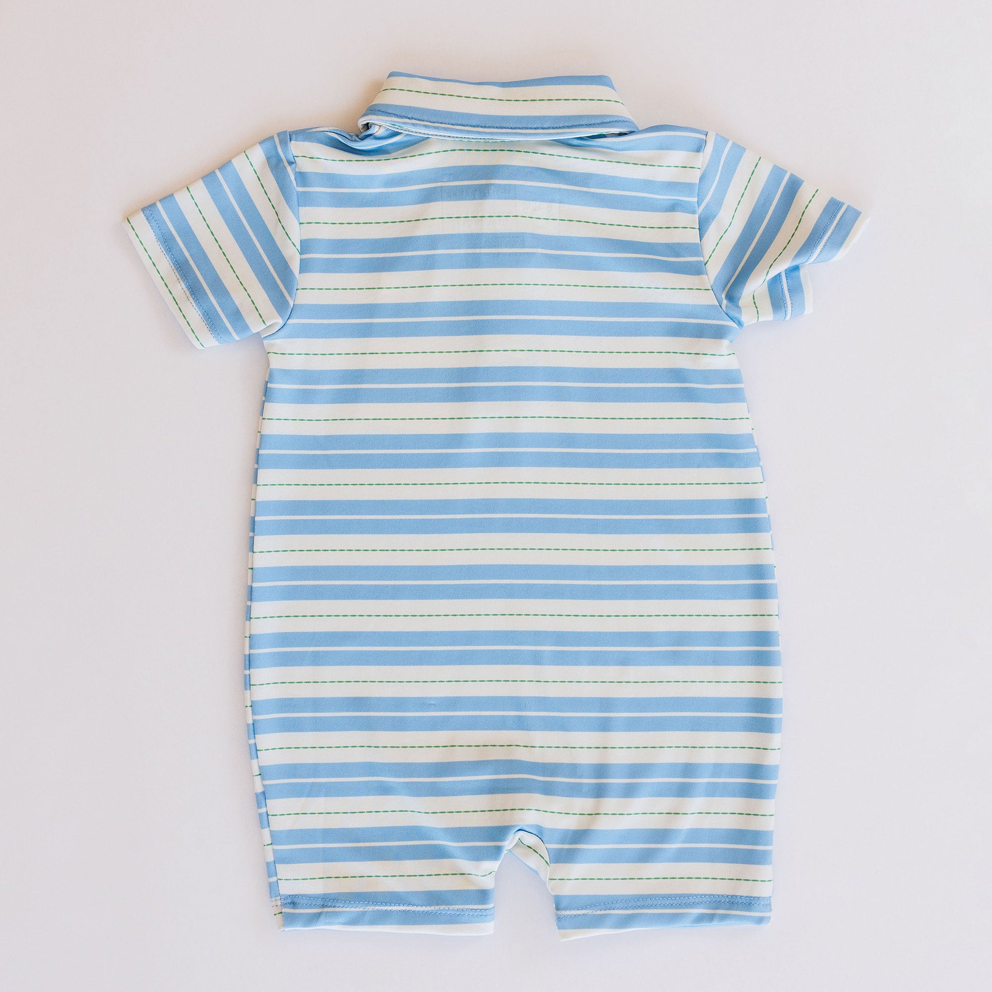 Blue and white striped baby romper on a light gray background