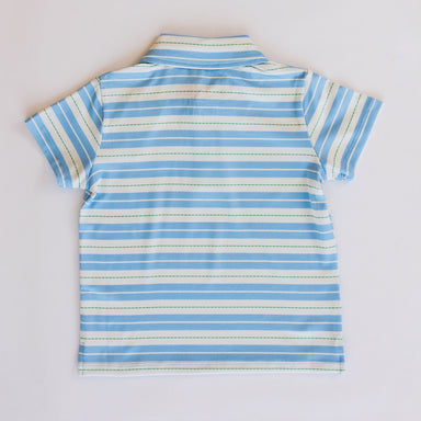 Blue and white striped shirt on a light gray background