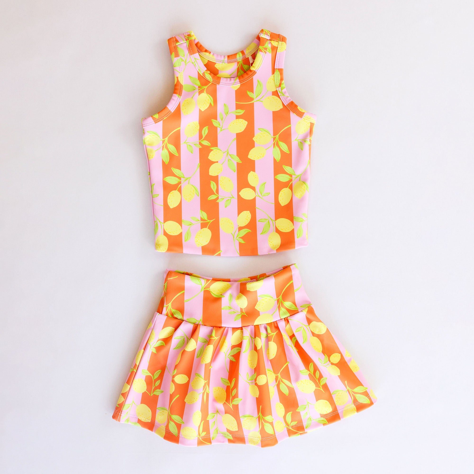 Two-piece outfit with striped pattern on a white background