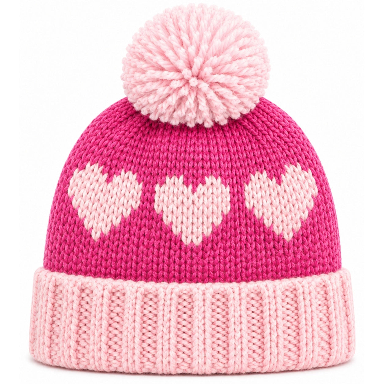 A pink knit beanie hat with a large fluffy pom-pom on top, three light pink hearts knitted across the front, and a ribbed light pink cuff, shown on a plain white background.
