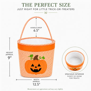 An orange and white gingham Halloween treat basket with an orange pumpkin face graphic, shown with measurement callouts for height, width, and handle drop, plus a circular inset showing the spacious interior.