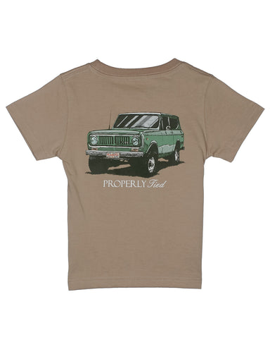 Brown t-shirt with a green SUV graphic and 'Properly Fed' text on a white background