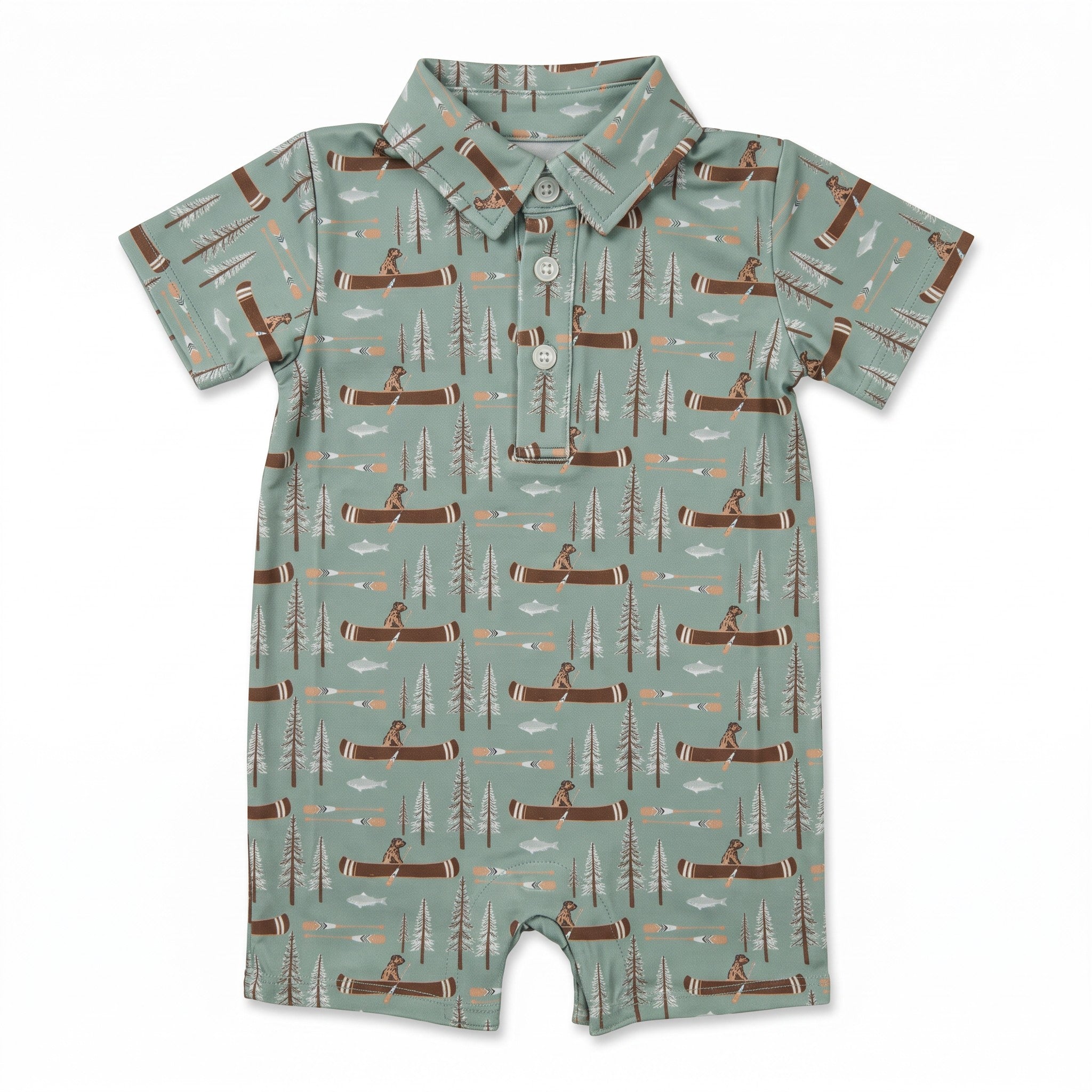 A baby short-sleeve polo romper in sage green with an all-over print of brown logs, pine trees, and figures in canoes, featuring a three-button collar.