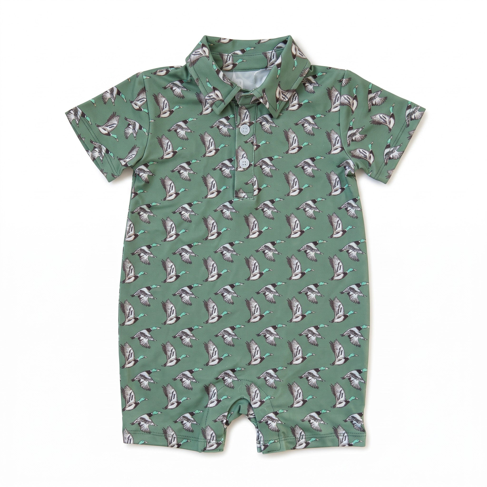 A short-sleeve baby romper in sage green with an all-over repeating print of penguins, shown flat on a white background.