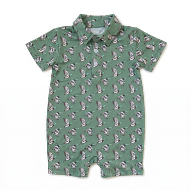 A short-sleeve baby romper in sage green with an all-over repeating print of penguins, shown flat on a white background.