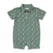 A short-sleeve baby romper in sage green with an all-over repeating print of penguins, shown flat on a white background.