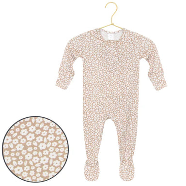 Baby onesie with floral pattern on a hanger against a white background