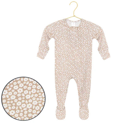 Baby onesie with floral pattern on a hanger against a white background