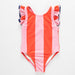 Pink and orange striped swimsuit with ruffled straps on a white background