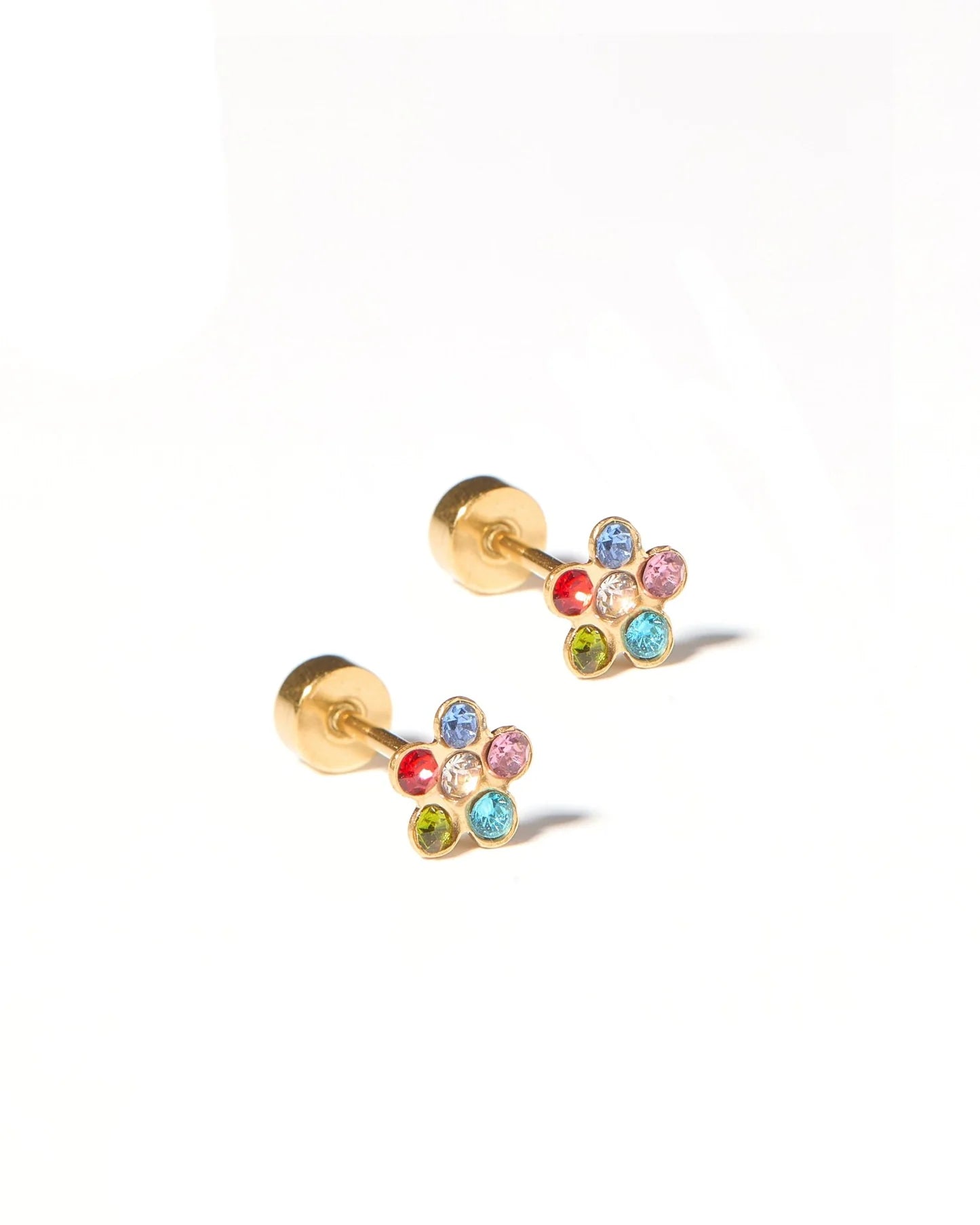 Pair of gold earrings with colorful gemstones on a white background