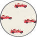 Round fabric sample with red fire truck pattern on a white background