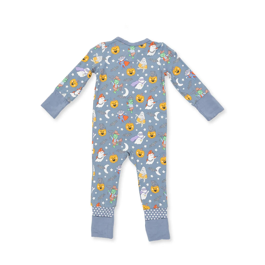 A baby's long-sleeve footed pajama romper in a dusty blue color, featuring a playful print of smiling pumpkins, ghosts, and moons on a starry background, with solid blue cuffs and a polka-dot pattern at the ankle cuffs.