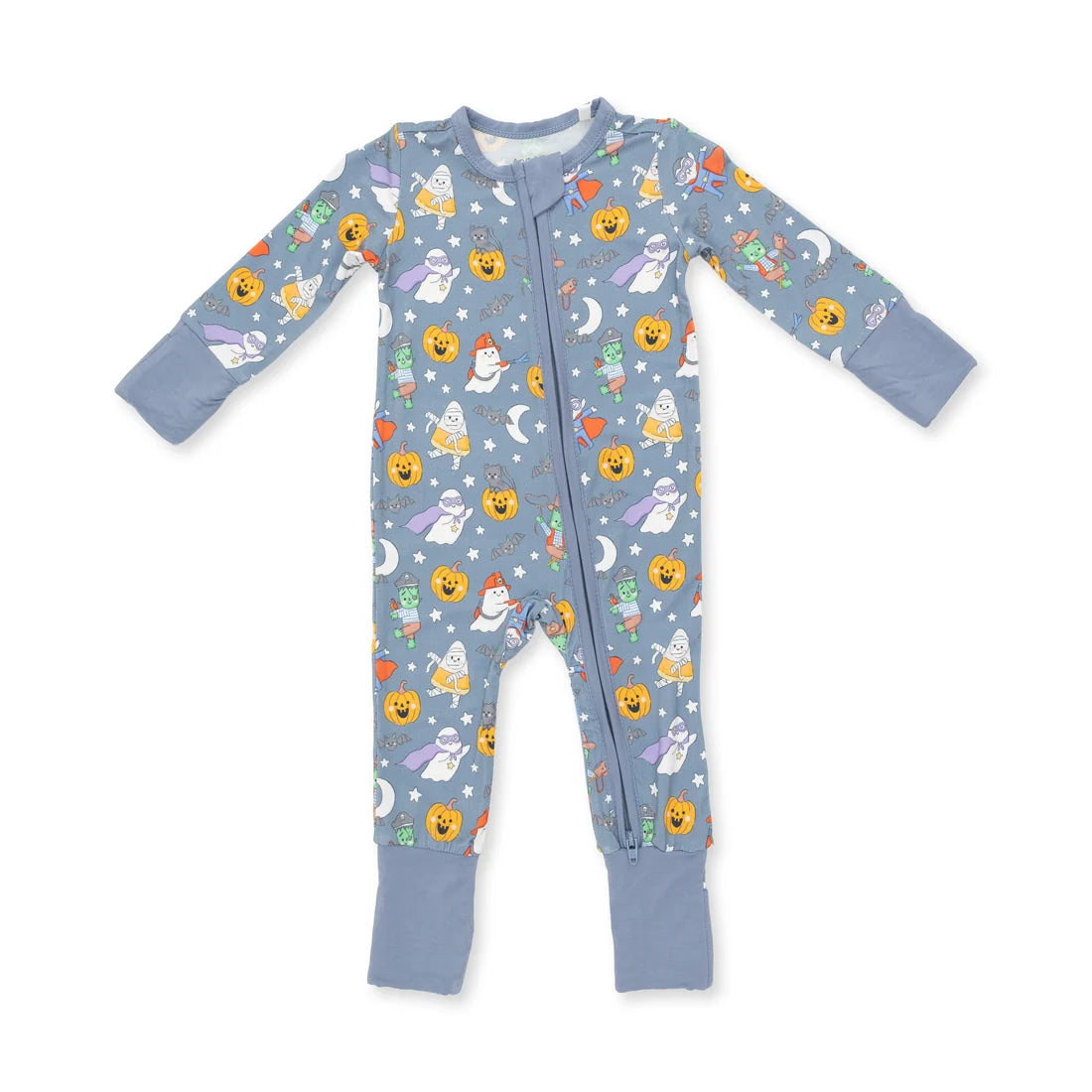 A baby's long-sleeve footed sleeper in a dusty blue color, decorated with a playful print of smiling ghosts, pumpkins, stars, and moons. The sleeper features a front zipper and ribbed cuffs on the wrists and ankles, shown flat on a white background.