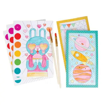 Colorful stationery items including cards and markers on a white background