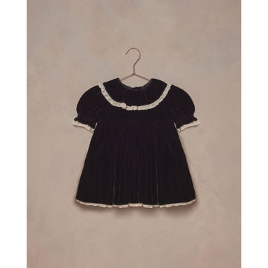 black velvet dress with puff sleeves and ruffle at the neck. Lace scallop details on sleeves, ruffles and bottom