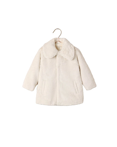 Noralee natural faux fur coat for children with an oversized collar long sleeves hidden front closure and side pockets displayed on a hanger