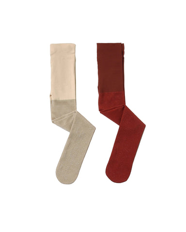 Noralee champagne and ruby shimmer tights displayed side by side on a white background with soft sparkle and contrasting warm tones