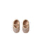 A pair of toddler ballet flats covered in rose gold glitter, featuring a thin metallic glittery strap across the top, shown from a top-down view on a white background.