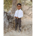 boy wearing olive green and ivory plaid skinny tie with white dress shirt and charcoal pants