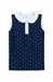 A sleeveless navy blue top with a white polka dot pattern, featuring a contrasting white Peter Pan collar and a white button placket.