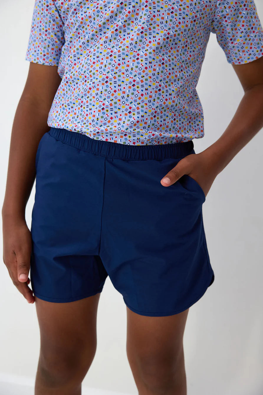 Boy in navy short