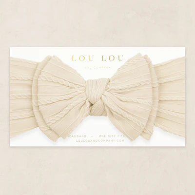 Beige colord cable knit bow headband