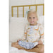 toddler girl wearing dainty dinosaur nightgown with ruffle detail