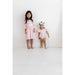 girls wearing 3/4 length sleeve pink dress with girly ghost print