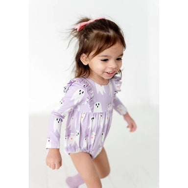 toddler girl wearing purple ruffle long sleeved bubble romper with girly ghost print