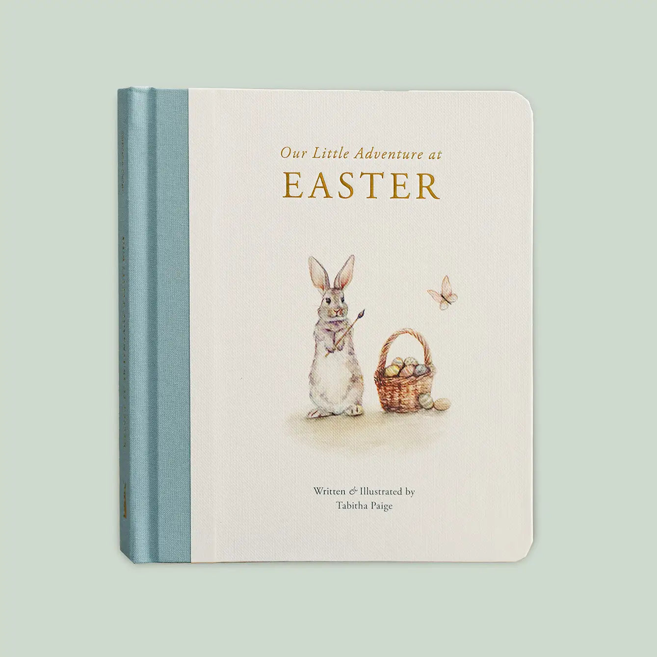 Book titled 'Our Little Adventure at Easter' with an illustration of a rabbit and basket on the cover.
