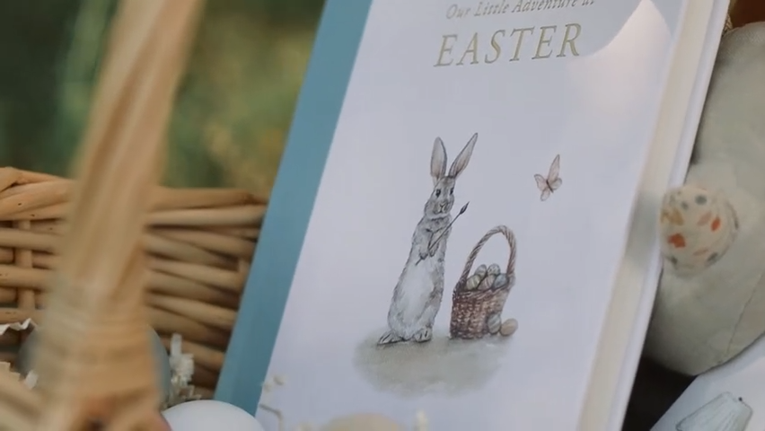 Easter book with a rabbit and basket design on a blurred natural background