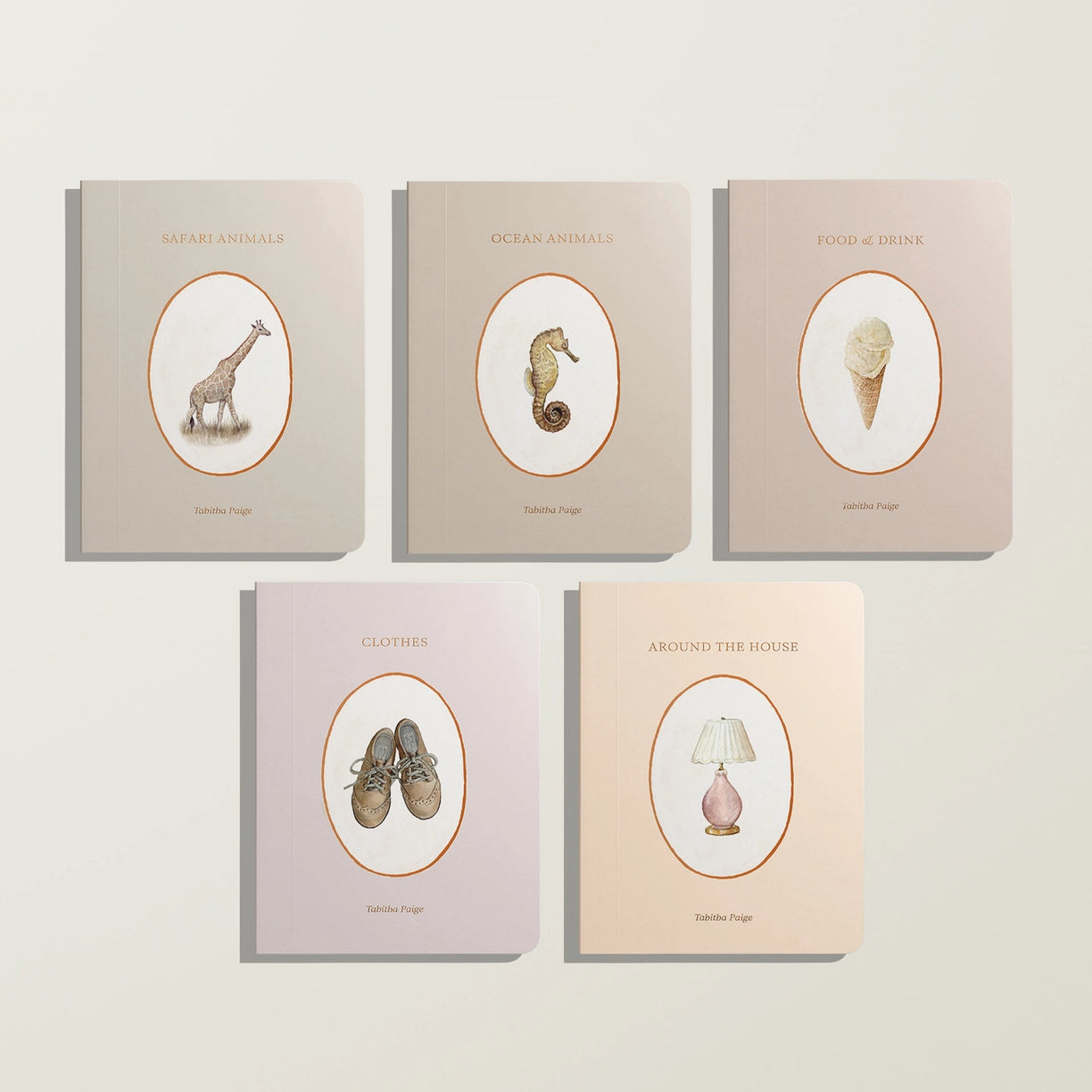 Five books with illustrations on their covers against a light gray background