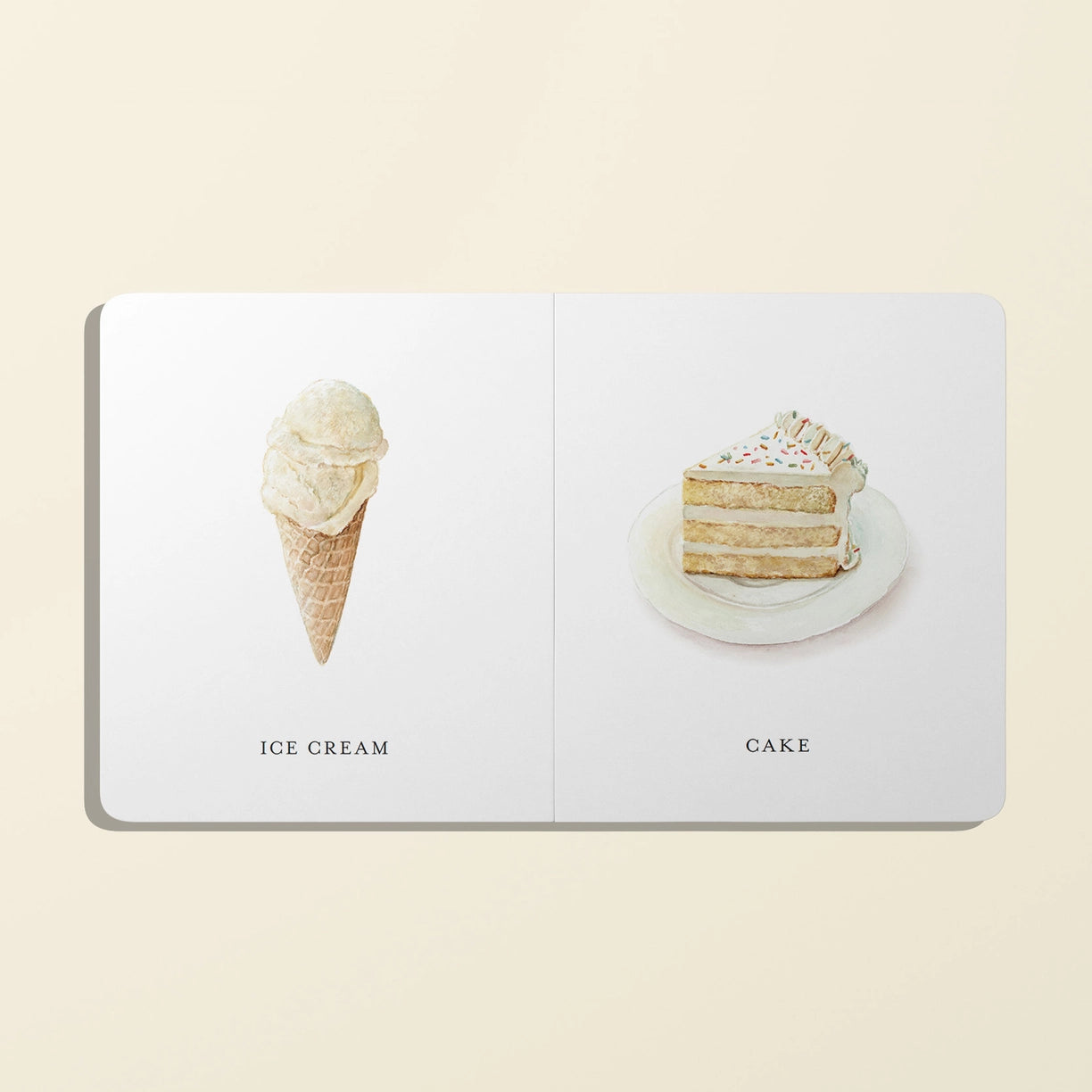 Open book with illustrations of ice cream and cake on a beige background