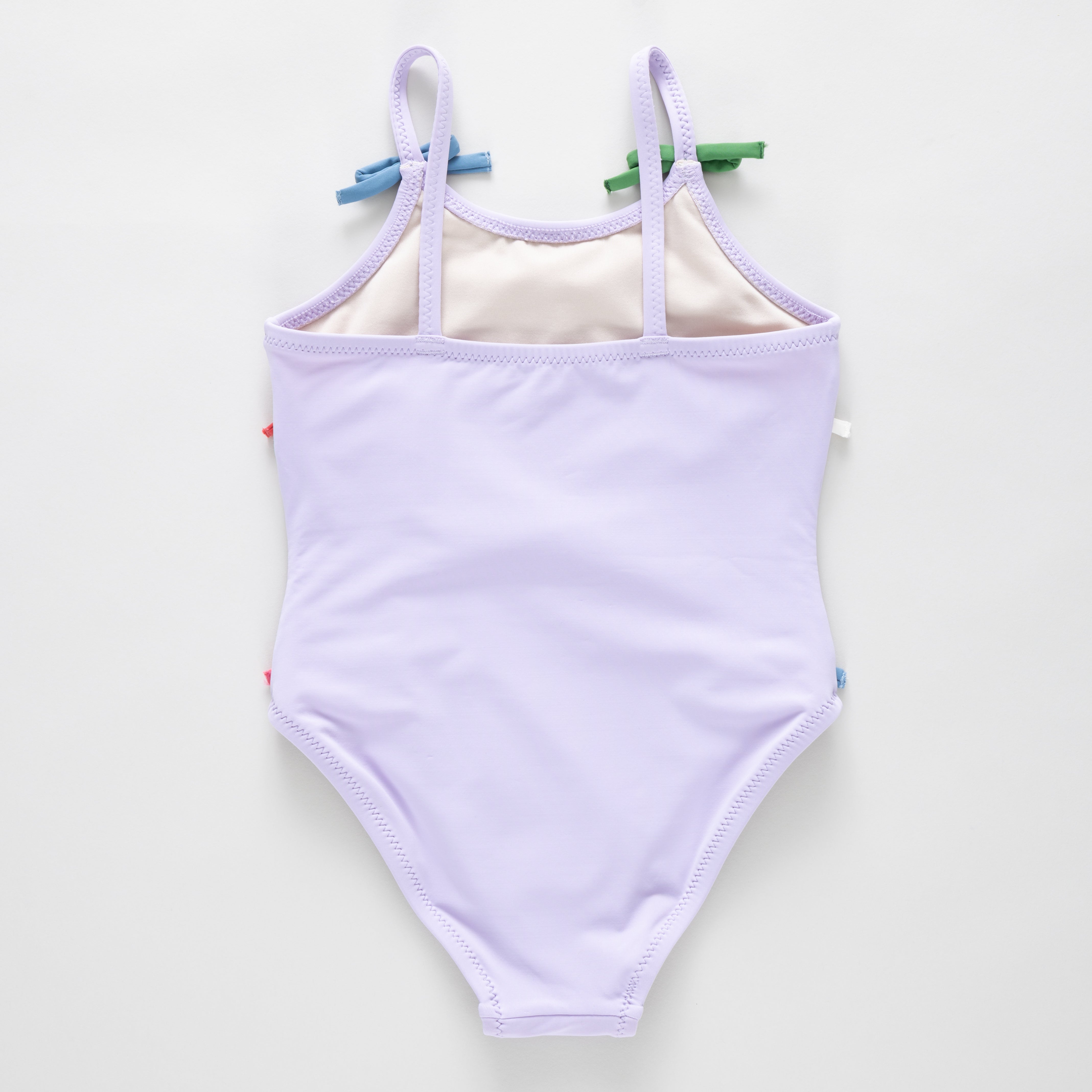 Lavender swimsuit on a white background