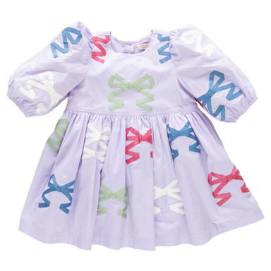 Lavender dress with colorful bow patterns on a white background