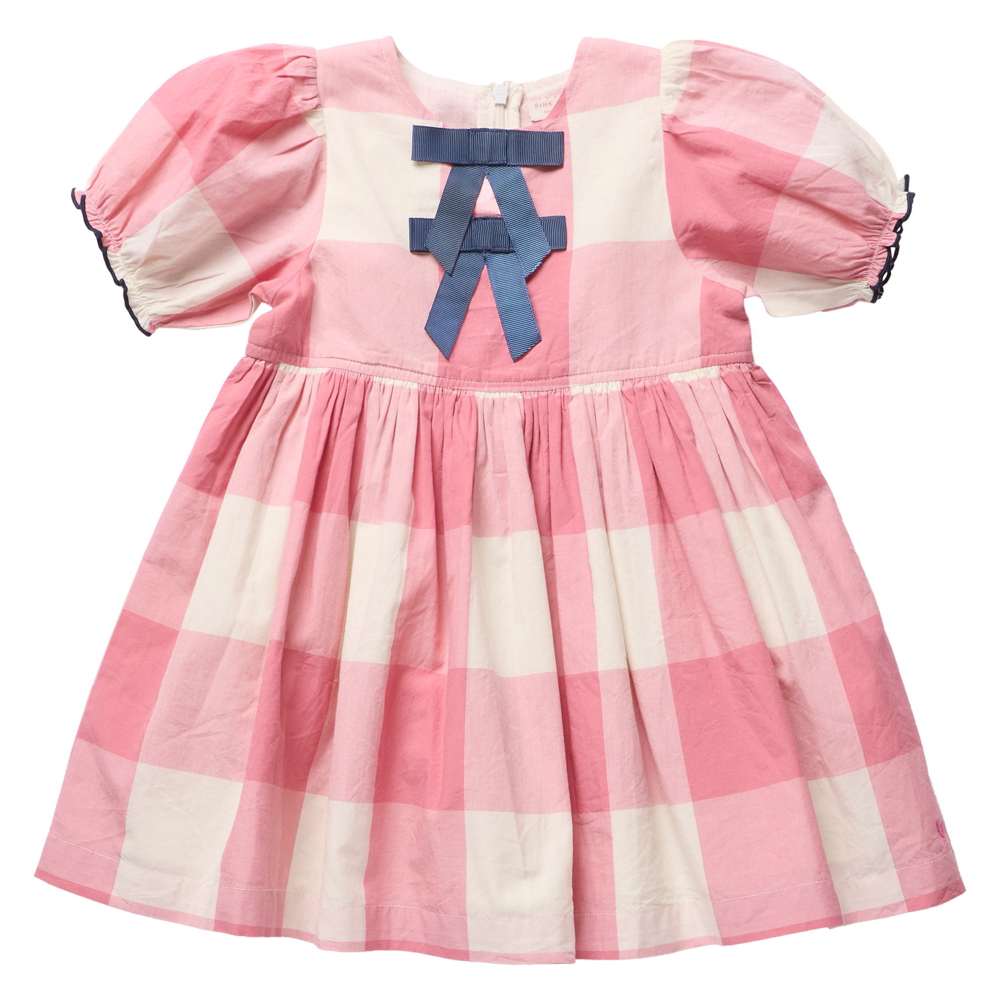A pink and white gingham baby dress with puff sleeves, a gathered skirt, and a blue bow detail on the chest.