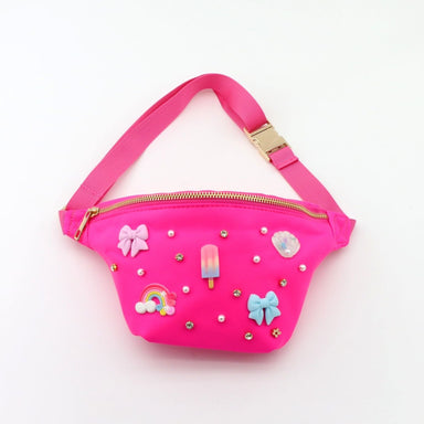 Pink fanny pack with decorative elements on a white background