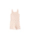 Light pink romper with  pattern on a white background