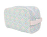 Cosmetic bag with pastel floral pattern on a white background