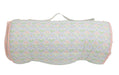 Roll-up nap mat with pastel floral pattern on a white background