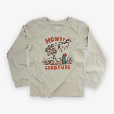off white colored long sleeve tee with "howdy christmas" graphic with santa's sleigh being pulled by a horse over a desert scene