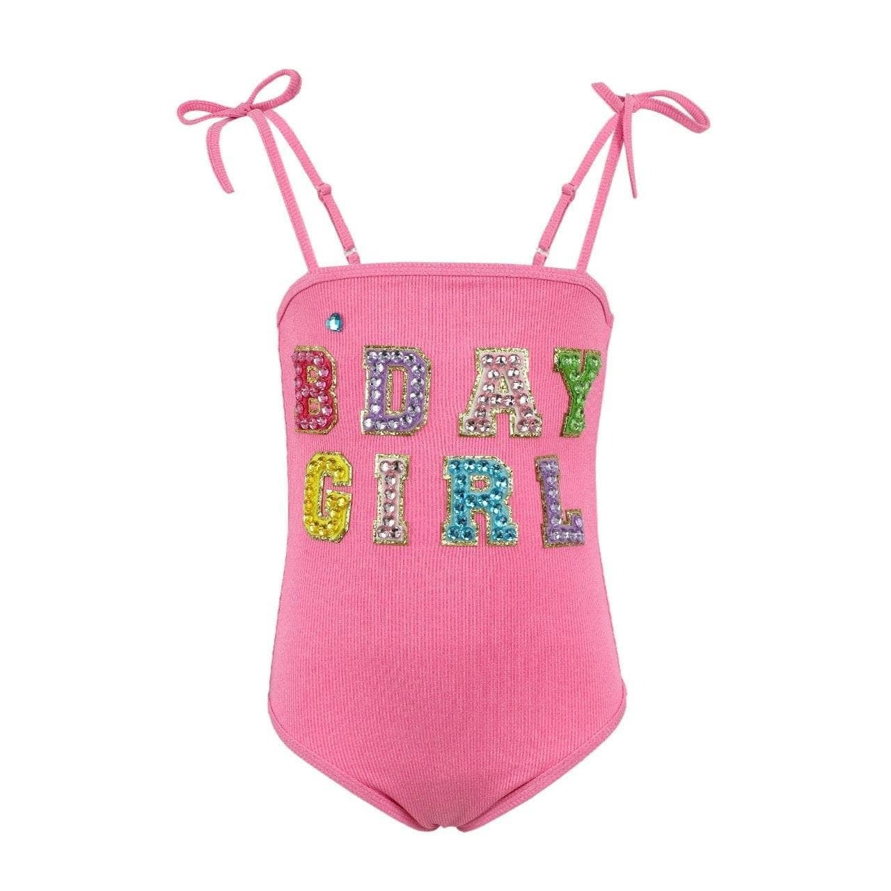 Pink swimsuit with 'B-Day Girl' text on a white background