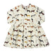 A long-sleeve children's dress with an all-over horse print on a cream background, featuring a button-up front and a gathered waist.
