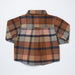 A long-sleeve plaid button-up shirt in a warm autumn color palette, featuring brown, orange, beige, and navy blue stripes, laid flat against a white background.