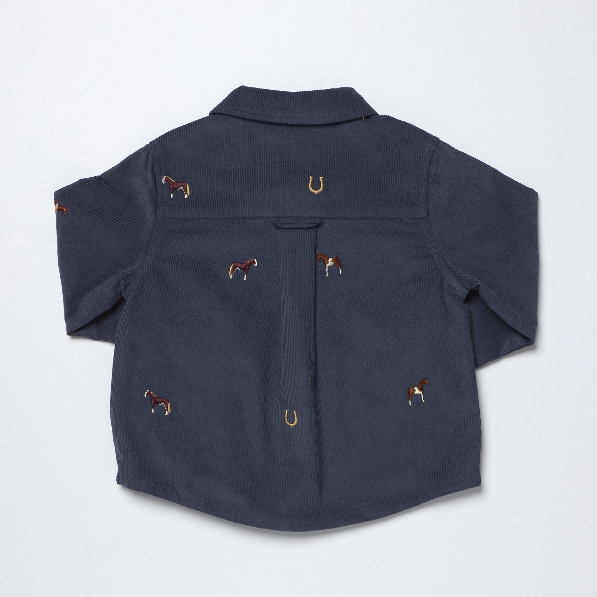Navy blue shirt with embroidered horse designs on a light gray background