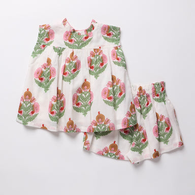 Floral patterned dress on a white background