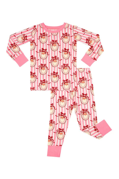 A two-piece children's pajama set featuring a pink and white striped pattern with santa faces wearing red bows, complete with solid pink cuffs and collar.