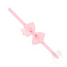 Pink bow headband on a white background